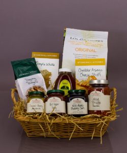 Gourmet gift basket filled with local honey and snacks