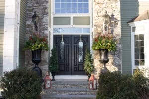 Exterior of home with festive planters